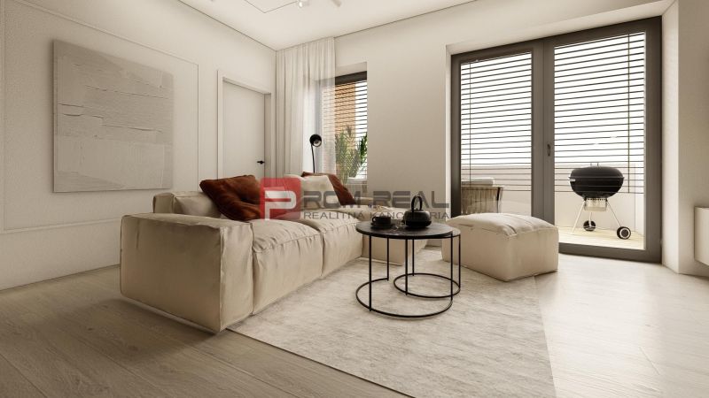 A comfortable living room in a 3-room apartment with a wooden-patterned floor and large windows.