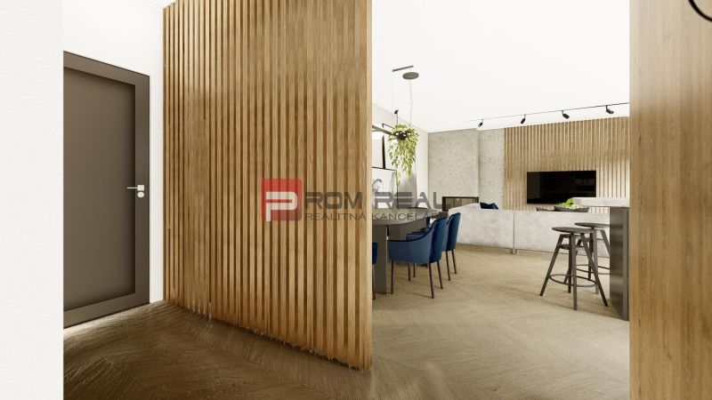 Interior of a 4-room apartment with a wall featuring a wooden decor and stylish furniture.