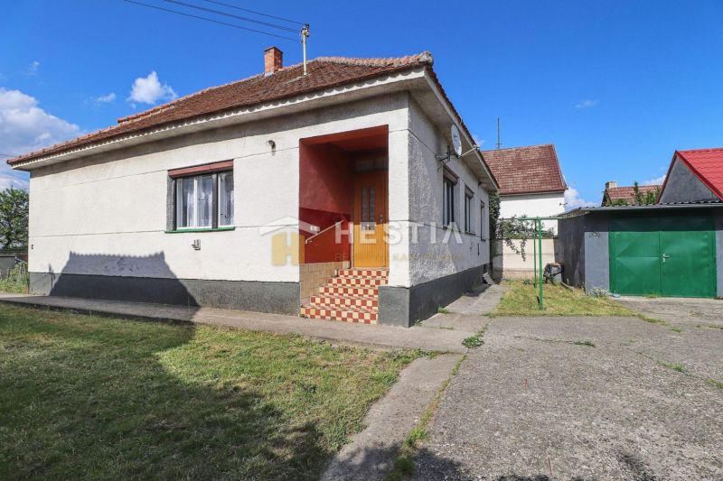A family house in Borský Mikuláš with a simple facade and a sloped roof.