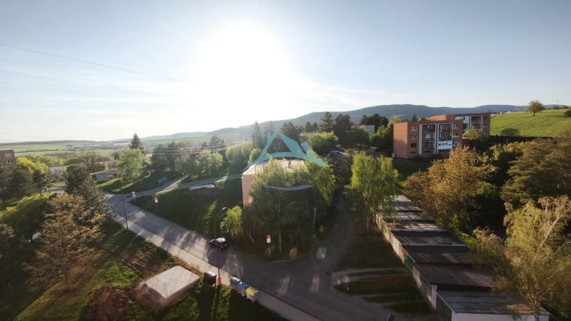 Sunny view of the green surroundings and apartments on Hviezdoslavova Street in Veľký Krtíš.