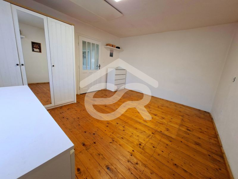 White wardrobe and wooden decor flooring in a family house.