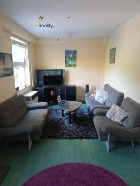 Living room with comfortable sofas and a television in hotels and guesthouses.