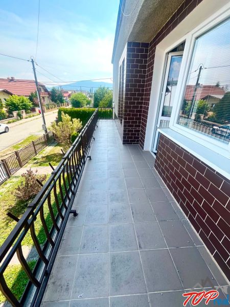 Balcony on a family house on Agátová Street in Čaňa with a metal railing.