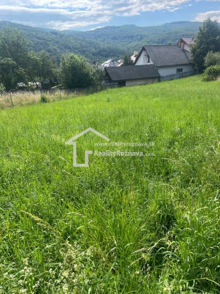 Green plots - living in Vlachovo with views of the mountains and houses.