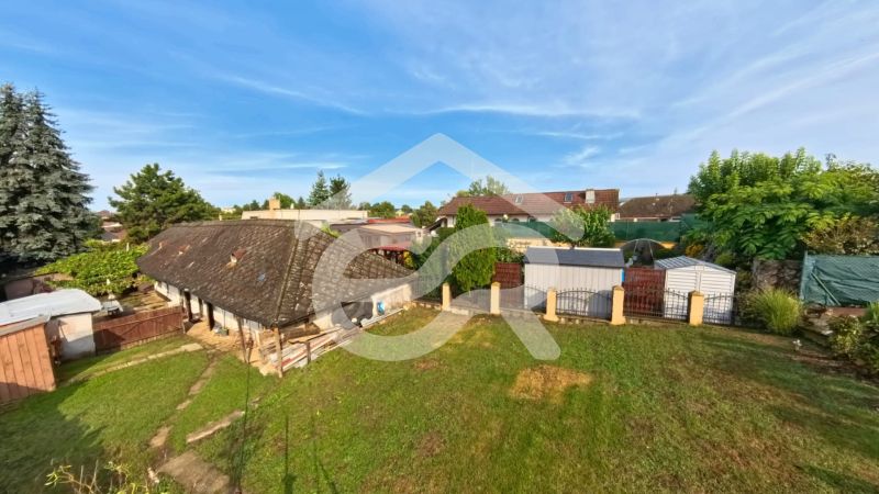 A family house on Hlavná Street in Lehota with a spacious garden and wooden structures.