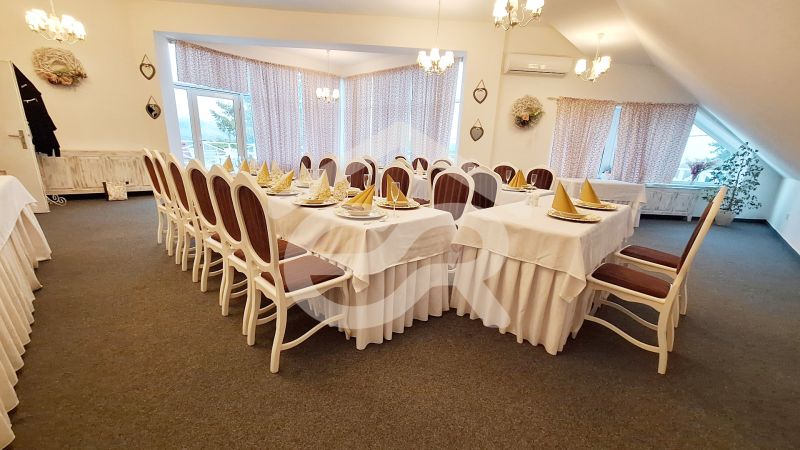 Stylish dining room in hotels and guesthouses with set tables and elegant decorations.