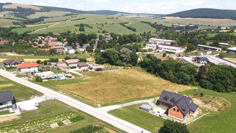 Land - housing on Laski Street in Vrbovce, with a view of the rural character of the landscape.