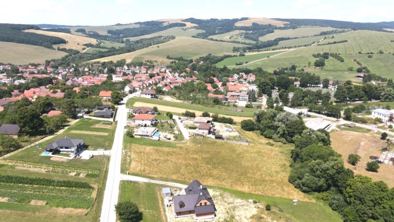 Aerial view of Vrbovce and Laski Street, residential plots surrounded by nature.