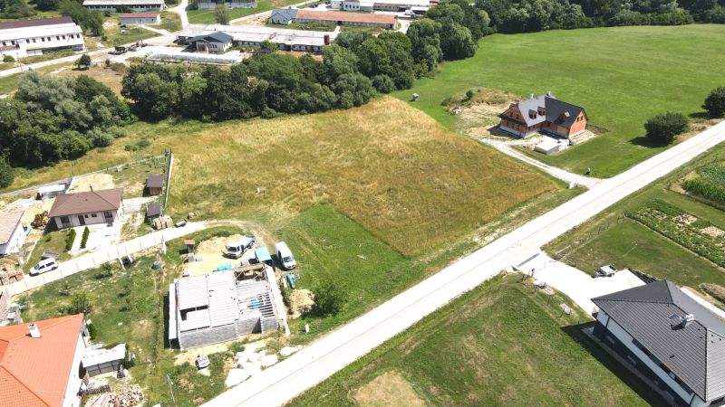 Aerial view of properties - housing in the village of Vrbovce on Laski Street, surrounded by greenery.