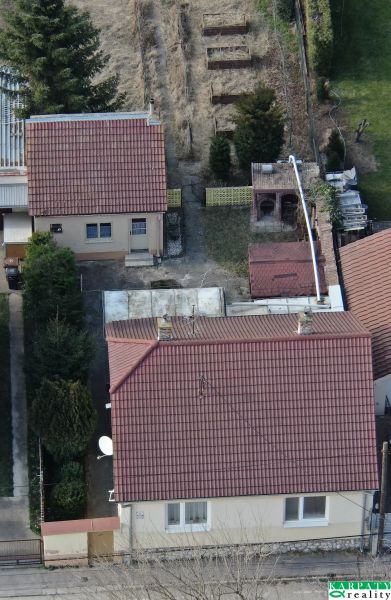 A family house on Krajná Street in Trnava with a yard and garden.