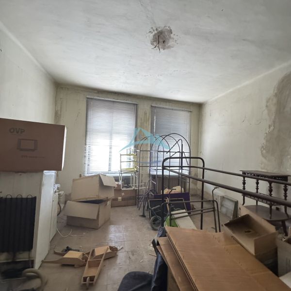 Disorder with cardboard boxes in the commercial premises on the Main Square in Šahy.