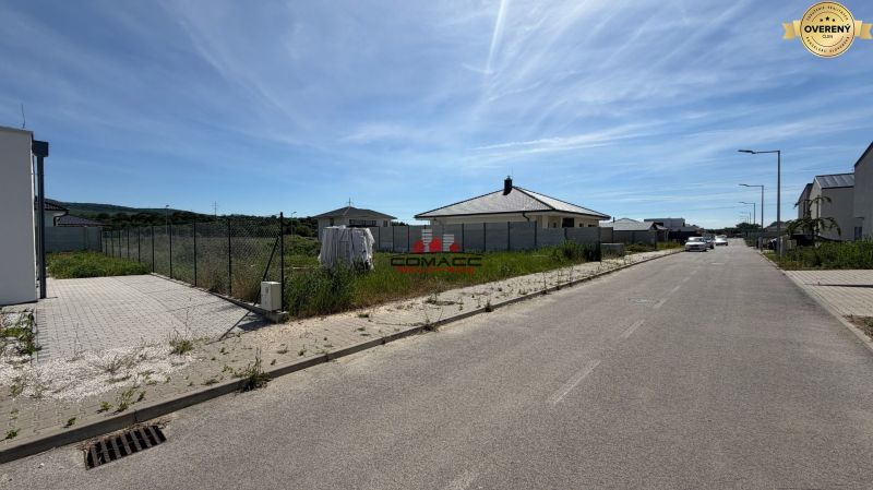 Dolinky Street in Moravany nad Váhom with development and a family house.