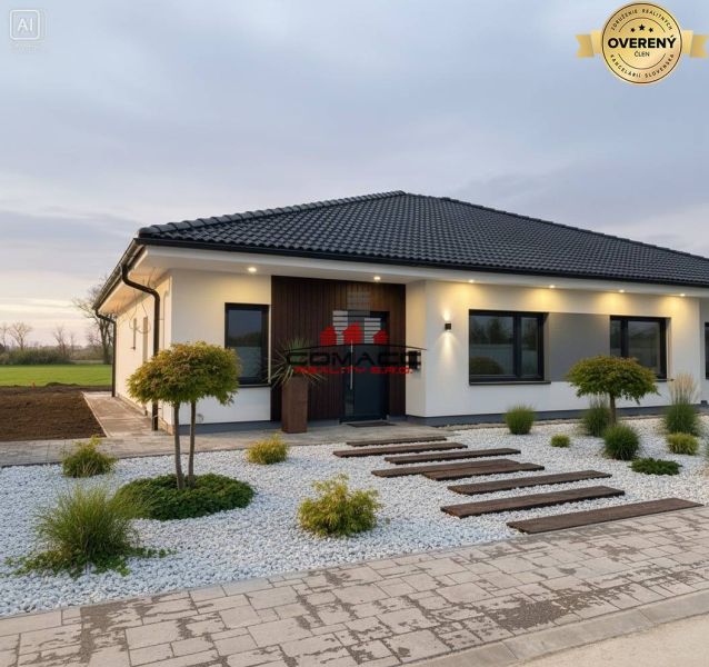 A family house on Ducovska Street in Moravany nad Váhom with a minimalist garden and pebbles.