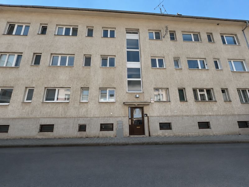 A building on Robotnícka Street in Banská Bystrica with multiple windows.