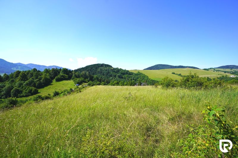 Green hills and meadows around the recreational plots in Lysice.