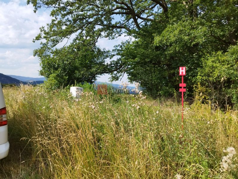 Residential plots in Ostrá Lúka with rich vegetation and views of the countryside.