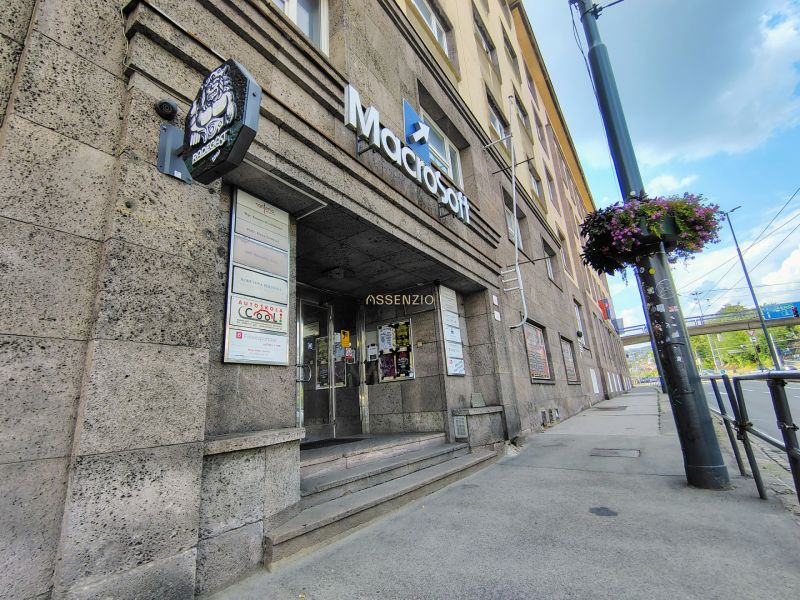 Offices on Štefánikova Street in Bratislava - Old Town, entrance area, logo on the facade.