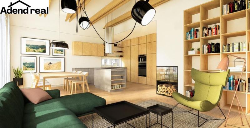 A living room in a family house with light furniture and a wooden-patterned floor.