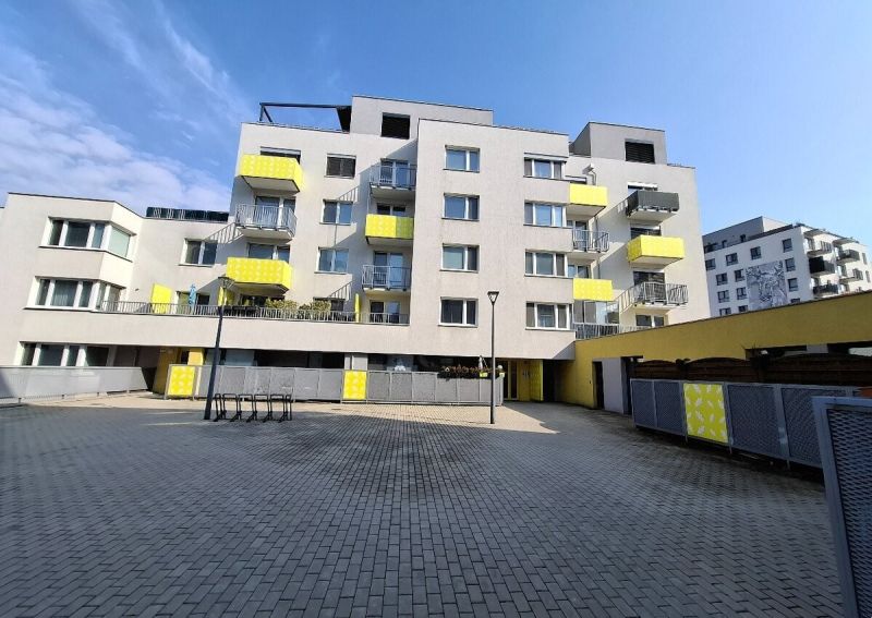 Apartment building with terraces and yellow balconies in Bratislava - Dúbravka.