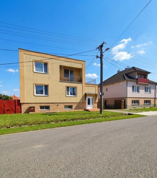 A family house in Lakšárska Nová Ves with a nice garden and a sunny facade.