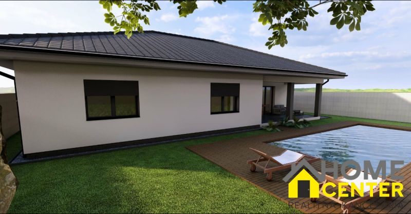 A family house on Hlavná Street in Marcelová with a garden, lawn, and swimming pool.