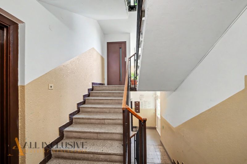 The staircase leads to the door in an apartment building on Gazdovský Rad in Šamorín.