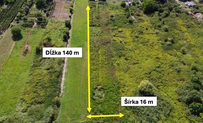 Residential plots in Bátorové Kosihy with greenery and visible dimensions.