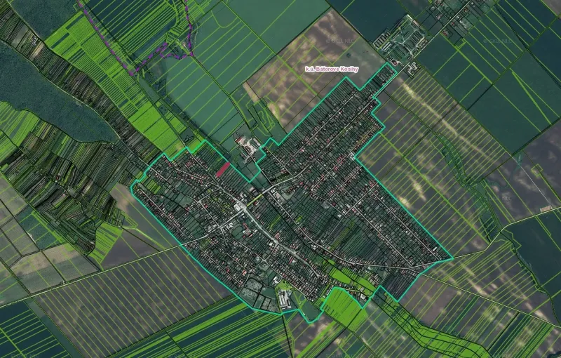 Aerial view of Bátorove Kosihy, Residential plots, with green fields surrounding the village.