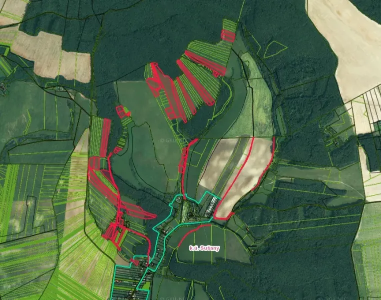 Map of agricultural and forest land around Sušany with marked boundaries.
