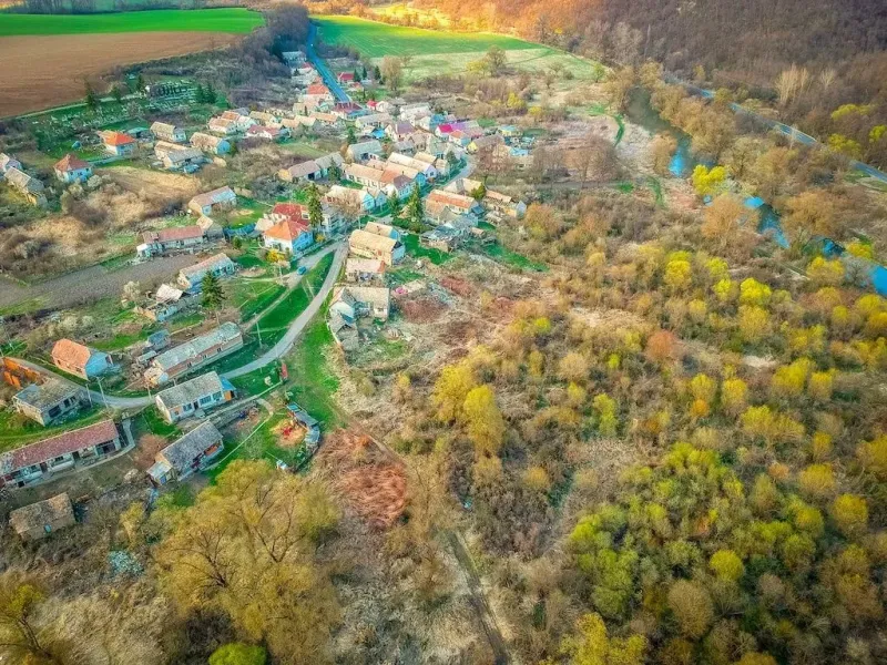 Aerial view of a picturesque village near Muľa, an ideal place for land - living.