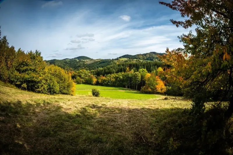 Autumn landscape with hills and colorful trees around Banská Štiavnica, Unusual properties.