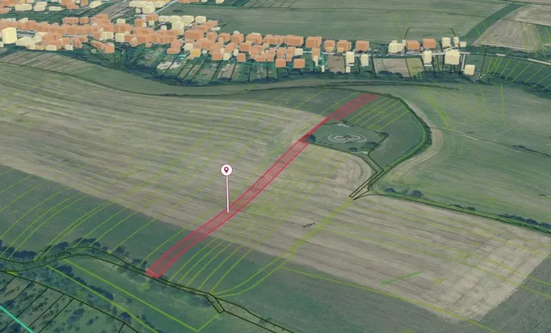 Agricultural and forest lands in Trenčianske Stankovce with visible parcels and road network.