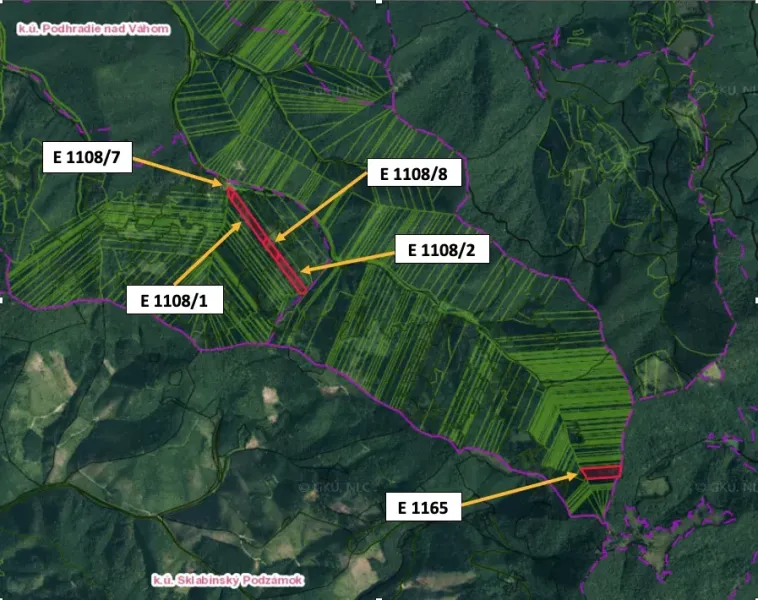 Aerial view of agricultural and forest lands in Podhradie with marked parcels.