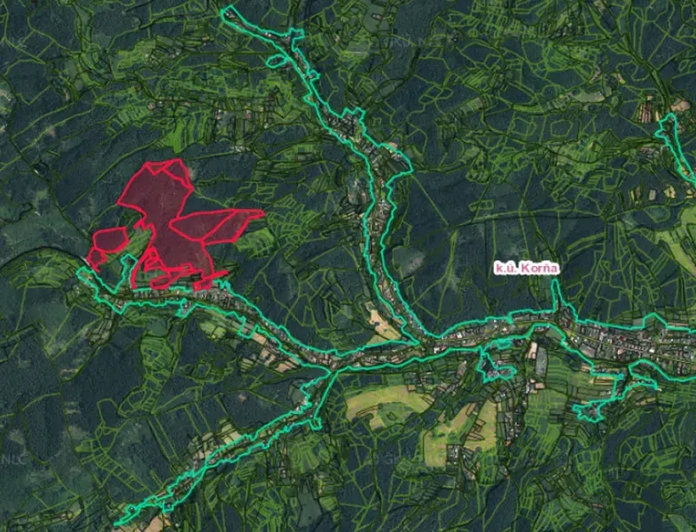 Map of agricultural and forest lands in the village of Korňa with highlighted area boundaries.