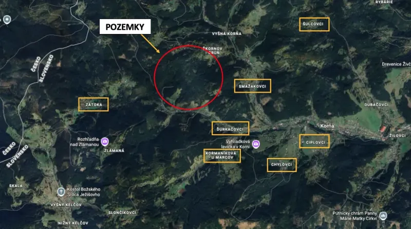 Aerial view of agricultural and forest lands around the village of Korňa.