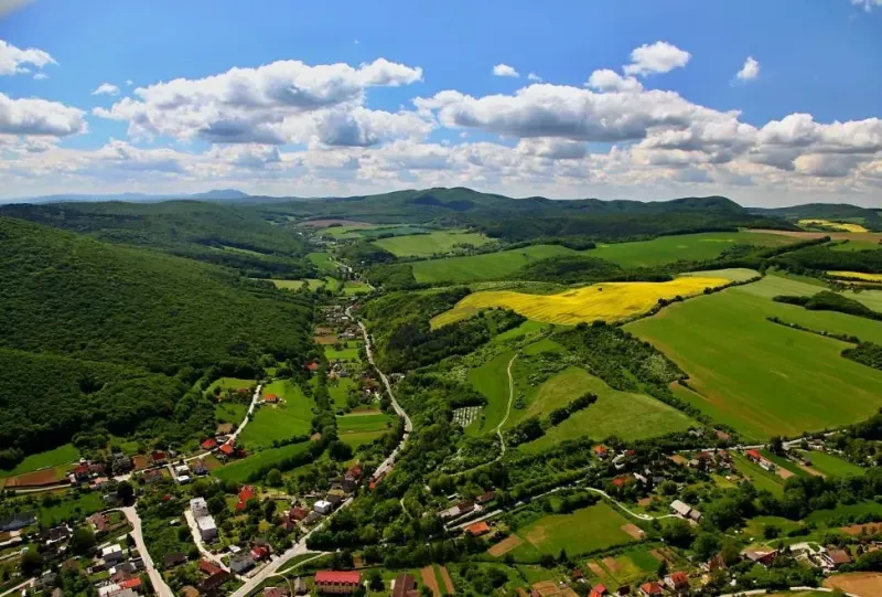 The landscape around the village of Prašník with fields and hilly terrain for Special properties.