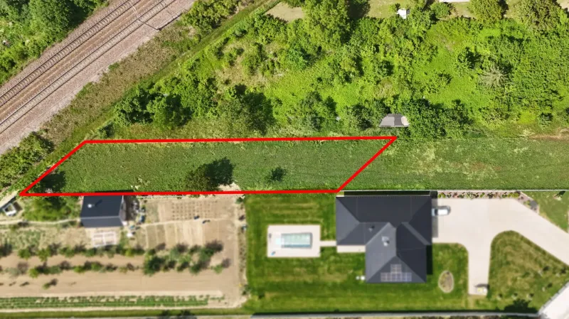 Aerial view of a residential plot in Nové Mesto nad Váhom with a marked parcel.