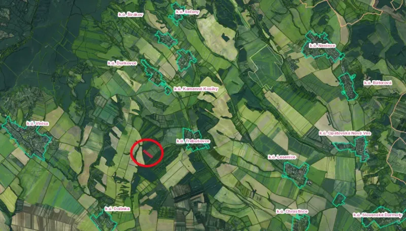 Aerial view of agricultural and forest lands around Trebušovce, marked area.