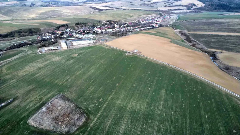 Agricultural and forest lands near Podhorany, capturing the landscape scenery and surrounding fields.