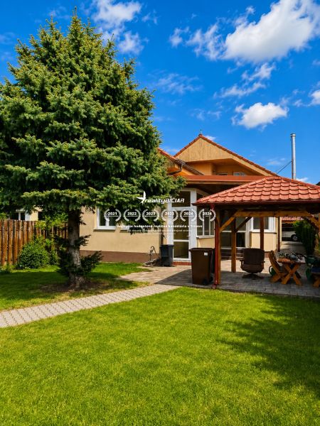 A family house on Hrnčiarska Street in Sereď with a gazebo and a well-maintained garden.