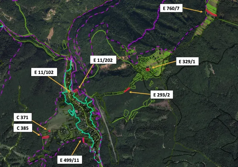Aerial view of agricultural and forest land near Dolný Harmanec with marked parcels.