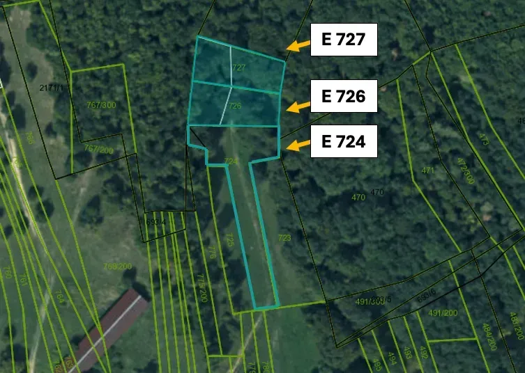 Aerial view of agricultural and forest lands near Omastiná with parcel markings.
