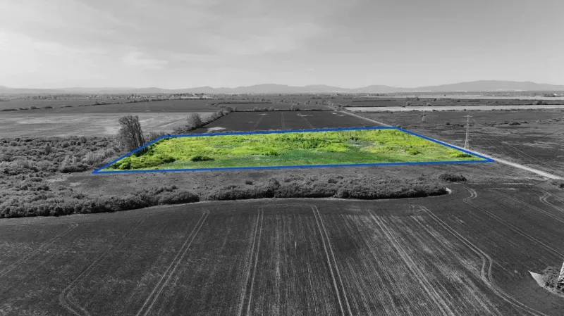 Agricultural and forest lands in Zemplínske Kopčany with a marked section on a vast field.