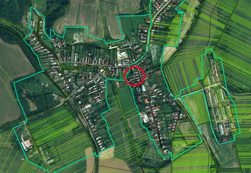 Aerial view of plots - housing in the village of Hrnčiarska Ves with marked area.