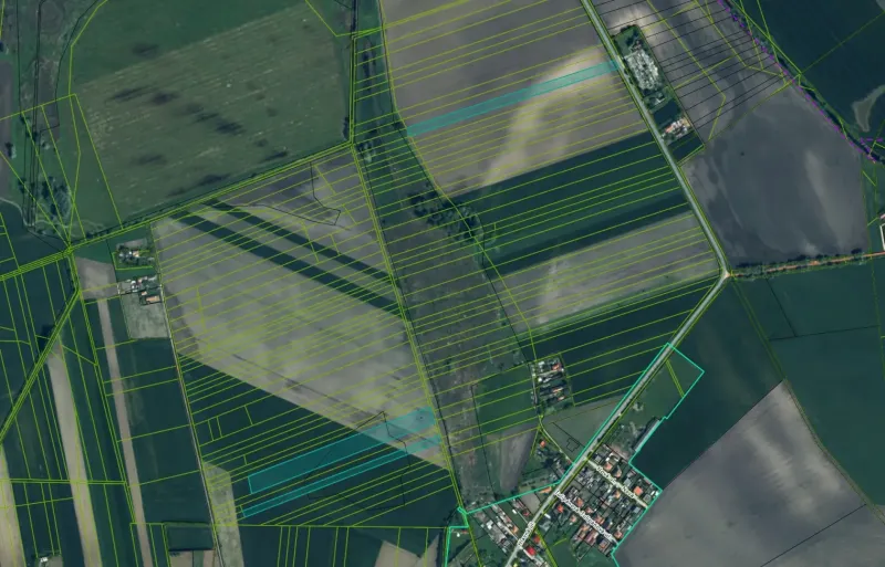 Aerial view of agricultural and forest lands around Komárno.