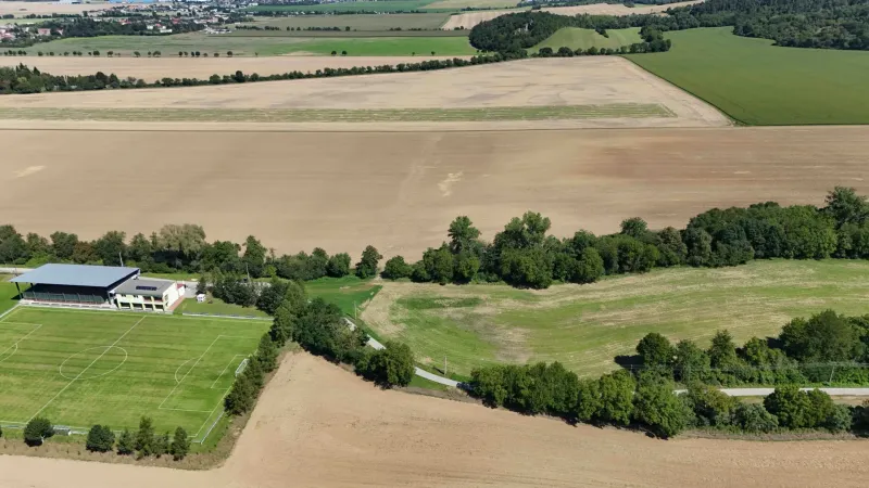 Aerial view of agricultural and forest lands near Nová Ves nad Váhom.