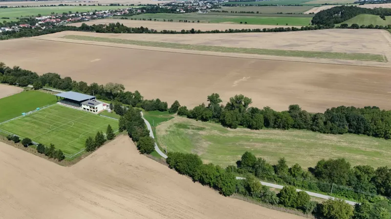 Agricultural and forest lands in Nová Ves nad Váhom include a playground and the surrounding landscape.