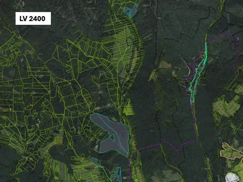 An aerial map of agricultural and forest lands near Brusno with marked parcel boundaries.