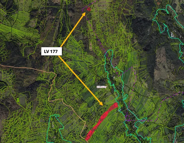 Meadows, agricultural and forest lands with a marked route on the map background.