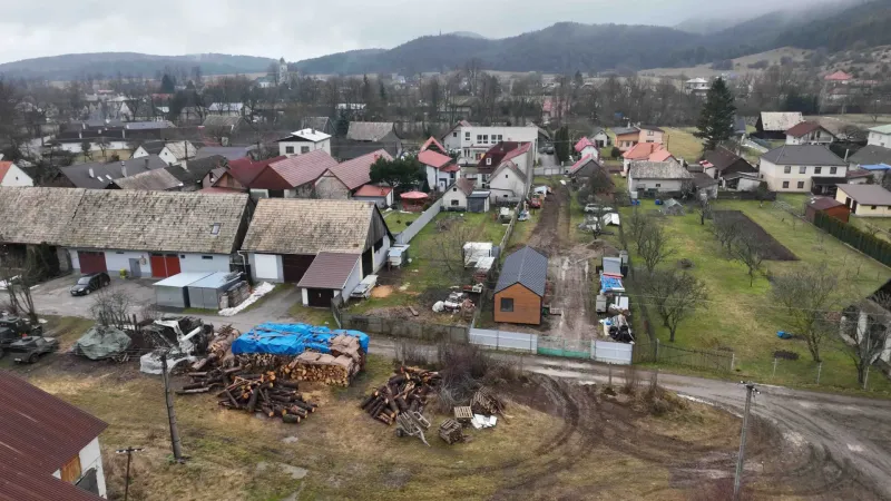Unusual properties in Kláštor pod Znievom with visible wooden shelters and gardens.